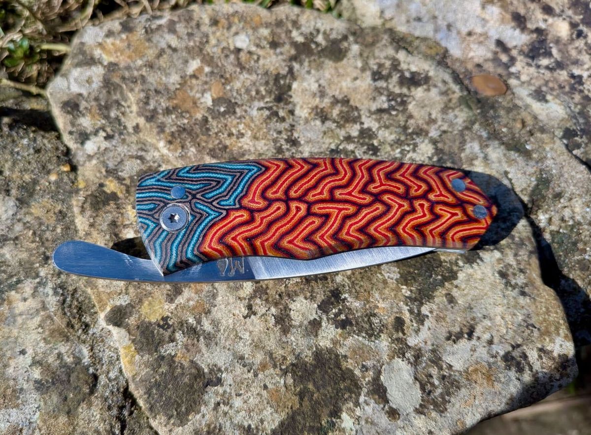 SF100 Sunfish friction folder half open