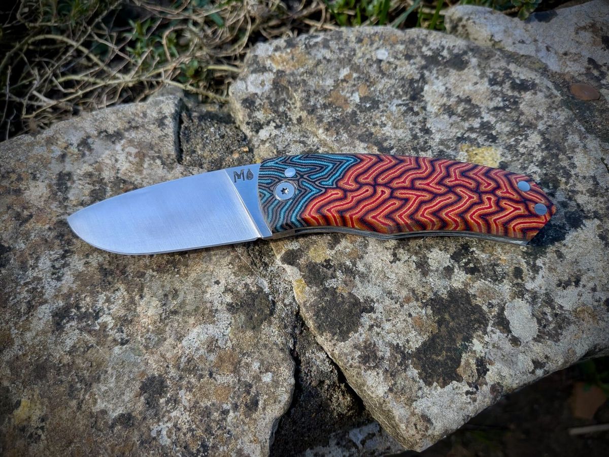 SF100 Sunfish friction folder open